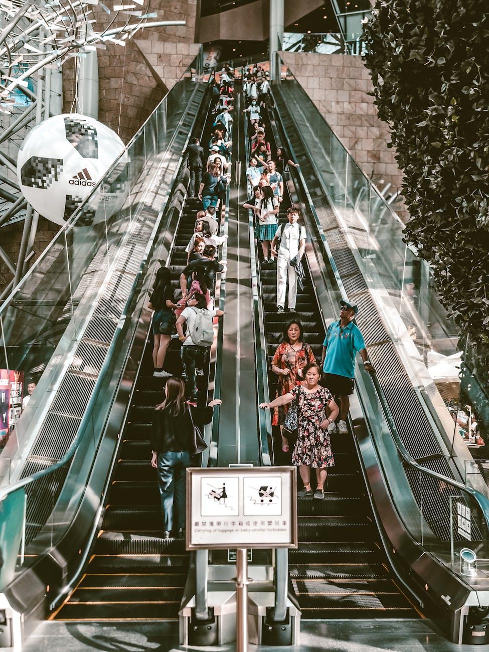a people on the escalator